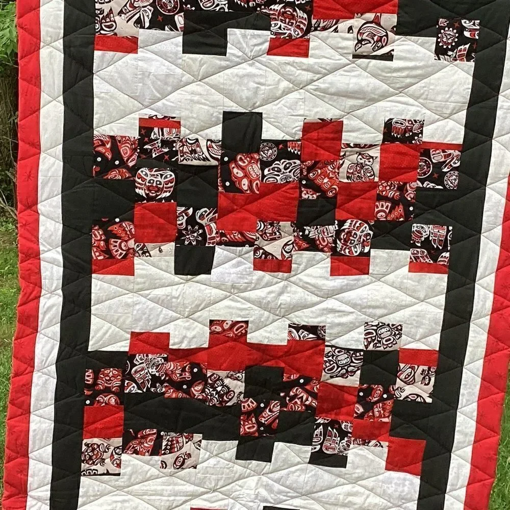 NWT. Hand Crafted Quilt Featuring Tlingit Tribal Prints
